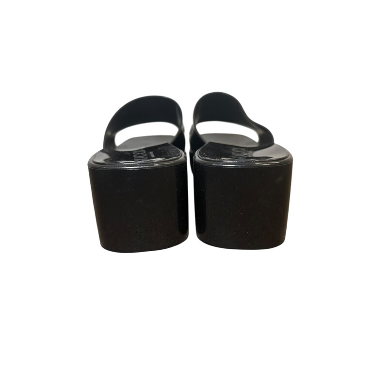 Gucci Black Rubber Platform Slides<br />
<br />
Size 37<br />
<br />
Style Code:624730<br />
<br />
In very good condition. Some scratches on the rubber.<br />
<br />
Does not come with the original dust bag or box.