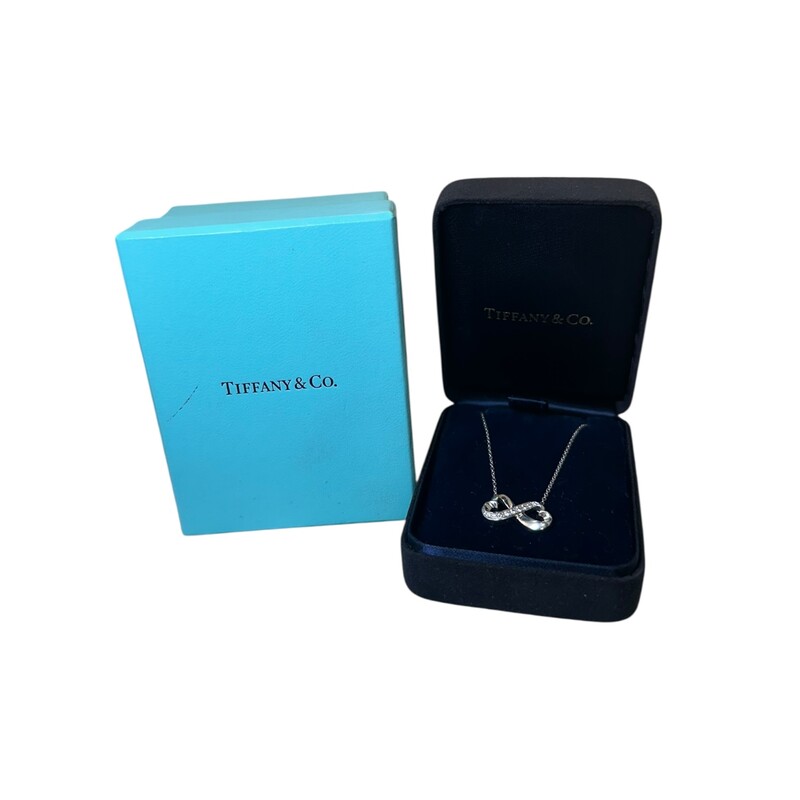 Tiffany & Co Infinity Heart Diamond Necklace

18k White Gold

Length 16-18 inches

Comes with original case and box