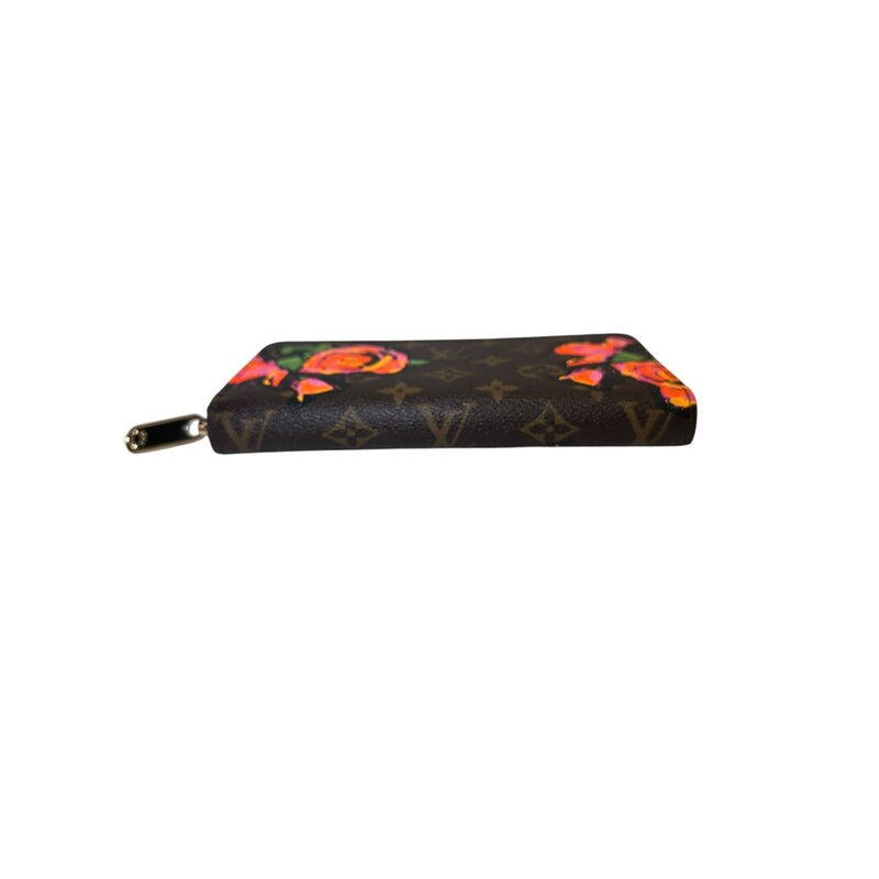 Louis Vuitton X Steven Sprouse Rose Zippy Wallet<br />
<br />
Date Code:CA1028<br />
<br />
In very good condition. Some minor scratching on the hardware.<br />
<br />
Comes with the original dust bag an box.