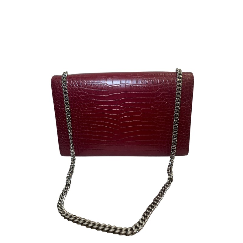 Saint Laurent Croc Embossed So kate Tassle Bag<br />
<br />
Serial Code: TCT3541190517<br />
<br />
Dimensions: 5.7H x 9.4W x 2.1D.<br />
<br />
In excellent condition. Some scratching on the hardware.<br />
<br />
Does not come with the original dust bag or box.
