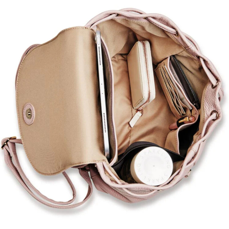 Levenger Carrie Handbag
Lt Pink Soft Pebble Leather Gold Hardware
Size: 14x5x10H
Your ideal companion for travel or everyday adventures. The beauty of this softly pebbled, leather backpack is in its details. There’s a pocket for every essential including your phone, your credit cards, your water bottle and more. Protect your iPad mini or small tablet in a padded pocket, while carrying other daily essentials. Every detail is beautifully and thoughtfully appointed.
Retail $249