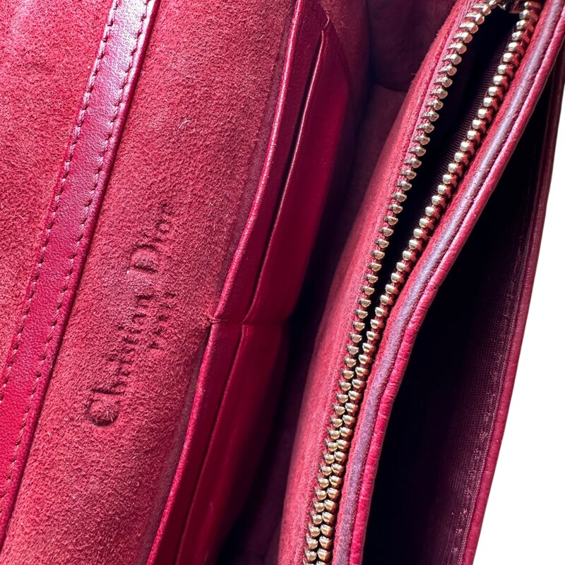 Dior Diorama Wallet on a Chain<br />
<br />
Serial Code: 12-MA-0147<br />
<br />
Dimensions: 15 L x 13 H inches<br />
<br />
In good condition. Scratching on the hardware and some interior fading and wear. Light wear to the exterior.<br />
<br />
Does not come with the original dust bag or box.