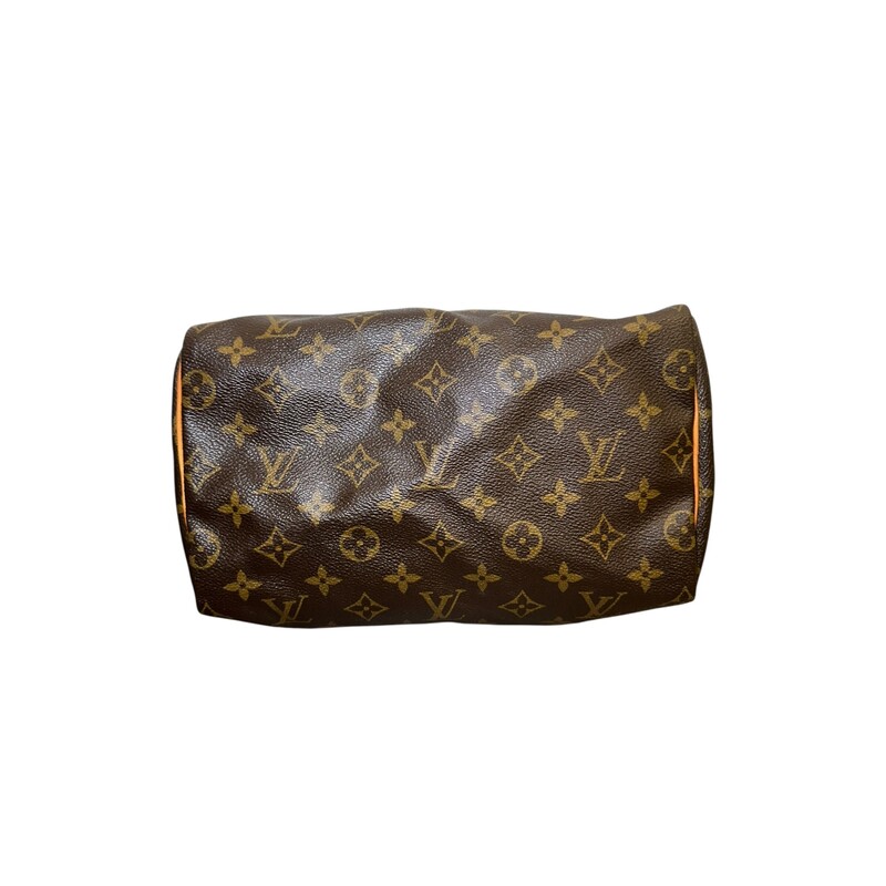 Louis Vuitton Monogram Speedy 35

Date Code: SP 1022

Dimensions: 9.8 L x 7.5 H x 5.9 W inches

In very good condition. Some natural wear on te handles and some marks on the leather.

Comes with the original dust bag no box. Comes with the original key and lock =.
