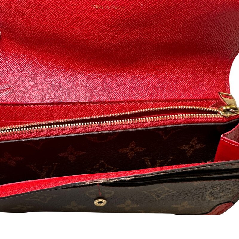 Louis Vuitton Retiro Sarah Wallet<br />
<br />
Date Code: Microchip<br />
<br />
Dimensions: 7 L x 4 H inches<br />
<br />
In good condition. Light tarnishing of the hardware and some scuffs on the leather piping. Initial H on top right corner of the flap.<br />
<br />
Does not come with the original dust bag or box.