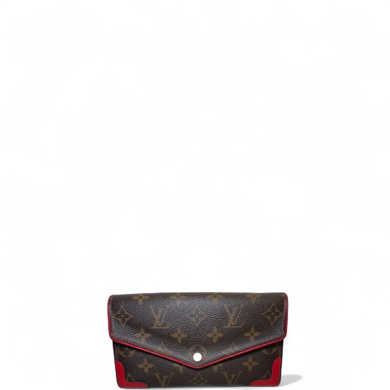 Louis Vuitton Retiro Sarah Wallet

Date Code: Microchip

Dimensions: 7 L x 4 H inches

In good condition. Light tarnishing of the hardware and some scuffs on the leather piping. Initial H on top right corner of the flap.

Does not come with the original dust bag or box.