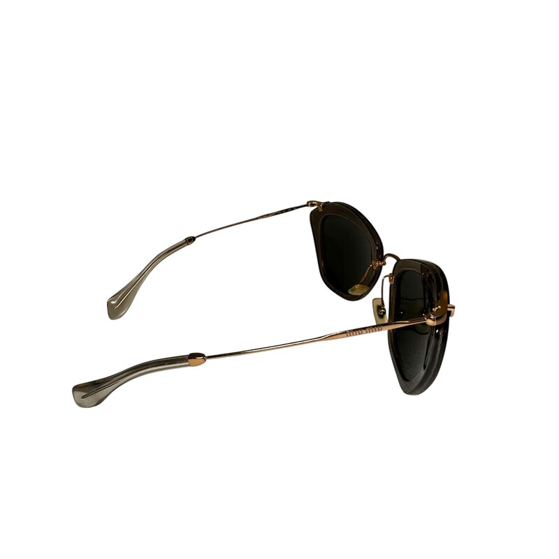 Miu Miu SMU10N Glitter Silver Sunglasses

Light scuffs to the frames.

Comes with the original case and dust bag.