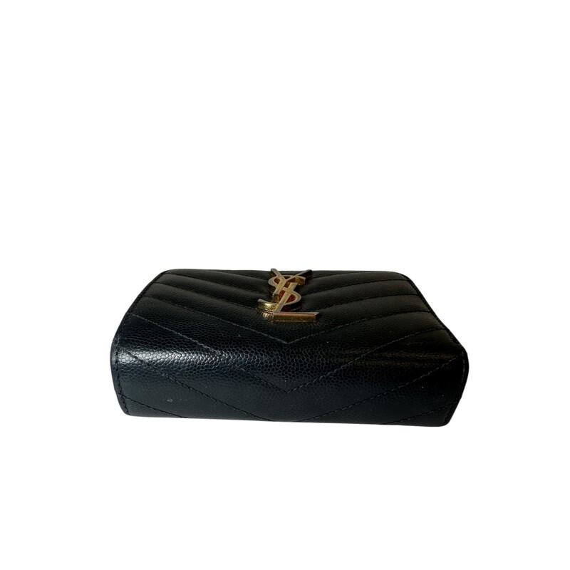 Saint Laurent Cassandre Compact Zip Wallet<br />
<br />
Serial Code:GNC403723.0517<br />
<br />
Dimensions: 5 L x 3 H inches<br />
<br />
In good condition. Some discoloration of the hardware. Some interior marks and slight stickyness of the leather.<br />
<br />
Does not come with the original dust bag or box.