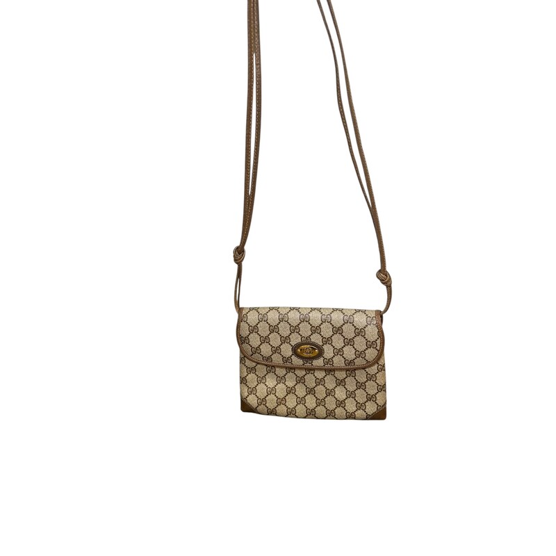 Gucci Vintage Logo Canvas and leather Strap bag<br />
<br />
Serial Code:007.49.5548<br />
<br />
Dimensions: 8 L x 6 H inches<br />
<br />
In very good condition. Some corner wear/<br />
<br />
Does not come with original dust bag or box.