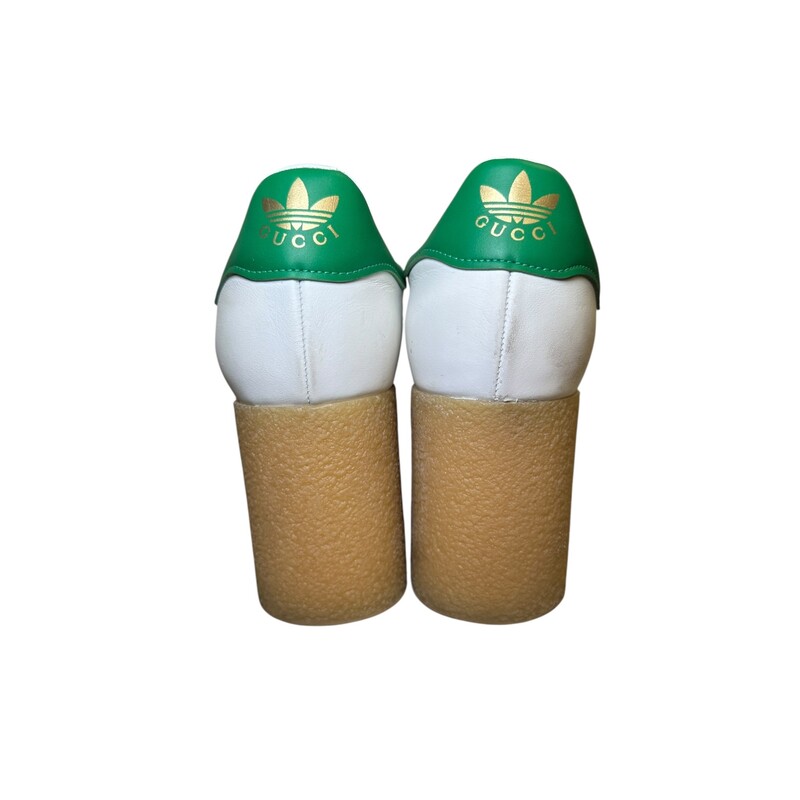 Gucci X Adidas Wedge Sneakers<br />
<br />
Size 41<br />
<br />
in good condition. Some scuffs throughout the leather and some wear on soles .<br />
<br />
Deos not come with oriignal dust bag or box.