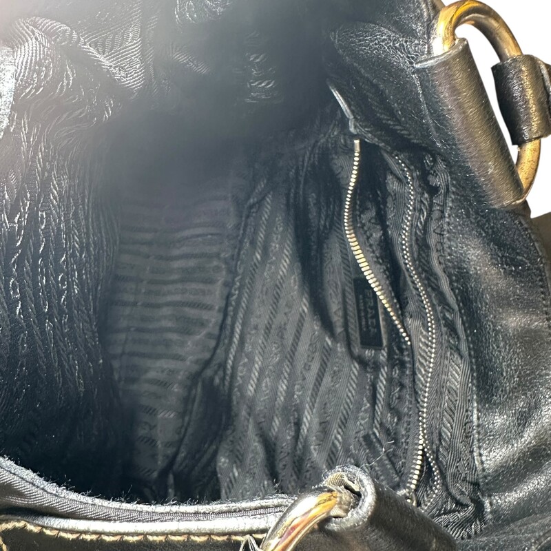 Prada Tuessto Moon Hobo Shoulder Bag<br />
<br />
Factory Code: 7/6<br />
<br />
Dimensions: 15 L x 13 H inches<br />
<br />
In very good condition. Light scratching of the hardware.<br />
<br />
Does not come with the original dust bag or box.