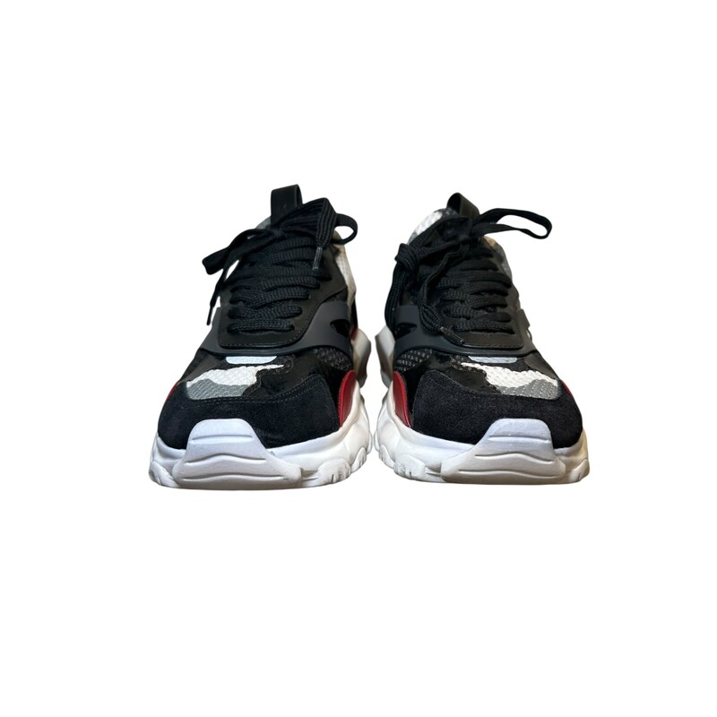 Valentino Running Sneakers<br />
Camo<br />
Size: 38.5<br />
<br />
In good condition.<br />
<br />
Does not come with original dust bag or box.