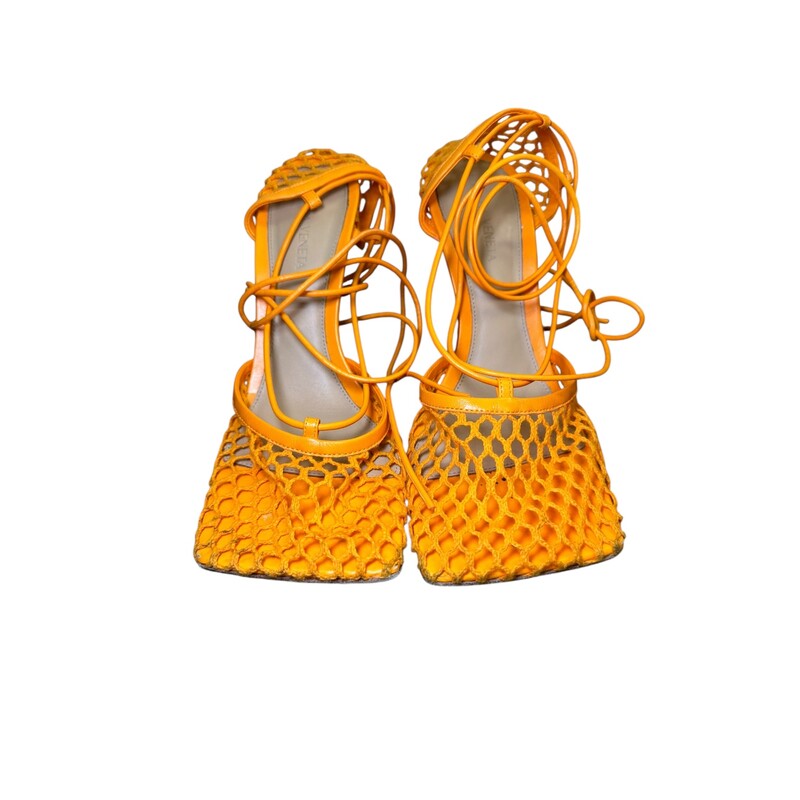 Bottega Venetta Stretch Lace Orange Heels<br />
<br />
Size 38<br />
<br />
In good condition. Light wear to the corner leather and light scuffs on back heels.<br />
<br />
Comes with the original dust bag. No box.