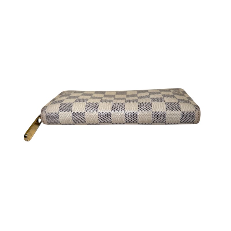 Louis Vuitton Damier Azur Zippy Wallet<br />
<br />
Date Code:VI2027<br />
<br />
Dimensions:<br />
Height: 3.75 in<br />
Width: 7.75 in<br />
Depth: 1.25 in<br />
<br />
In good condition. Some marks on the canvas and some interior marks.<br />
<br />
Does not come with original dust bag or box
