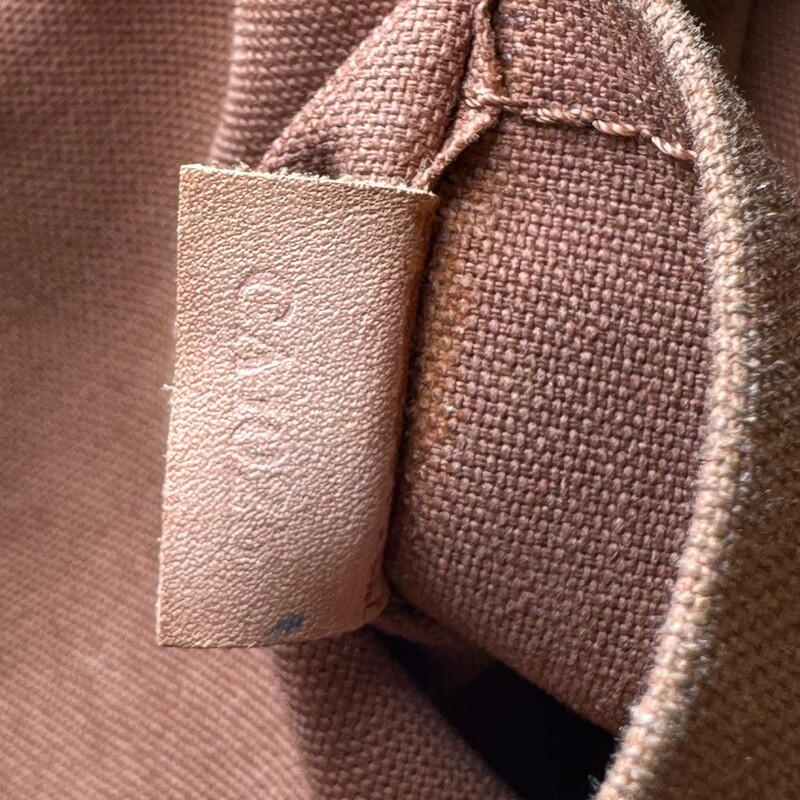Louis Vuitton Tulum Monogram GM<br />
<br />
Date Code:<br />
<br />
Dimensions: CA0205<br />
<br />
Length: 13.5 in<br />
Height: 11 in<br />
Width: 3.5 in<br />
Drop: 9.5 in<br />
<br />
In good condition. Some tarnshing of the hardware, water marks on the leather and some corner wear.<br />
<br />
Does not come with the original dust bag or box