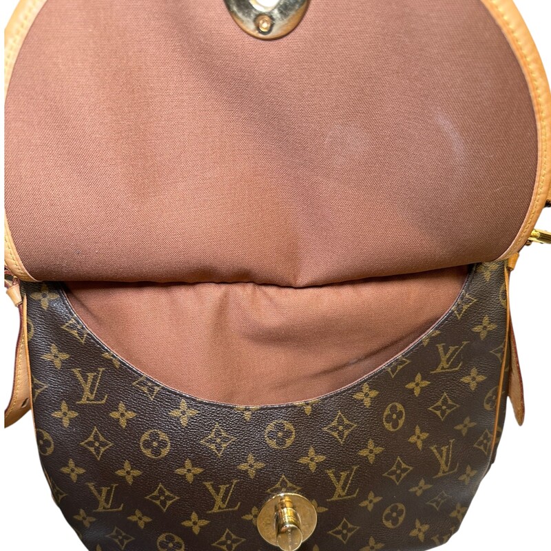Louis Vuitton Tulum Monogram GM<br />
<br />
Date Code:<br />
<br />
Dimensions: CA0205<br />
<br />
Length: 13.5 in<br />
Height: 11 in<br />
Width: 3.5 in<br />
Drop: 9.5 in<br />
<br />
In good condition. Some tarnshing of the hardware, water marks on the leather and some corner wear.<br />
<br />
Does not come with the original dust bag or box