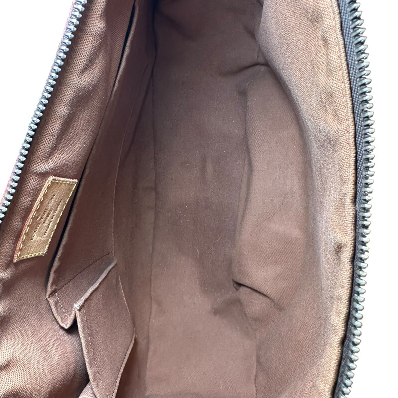 Louis Vuitton Tulum Monogram GM<br />
<br />
Date Code:<br />
<br />
Dimensions: CA0205<br />
<br />
Length: 13.5 in<br />
Height: 11 in<br />
Width: 3.5 in<br />
Drop: 9.5 in<br />
<br />
In good condition. Some tarnshing of the hardware, water marks on the leather and some corner wear.<br />
<br />
Does not come with the original dust bag or box