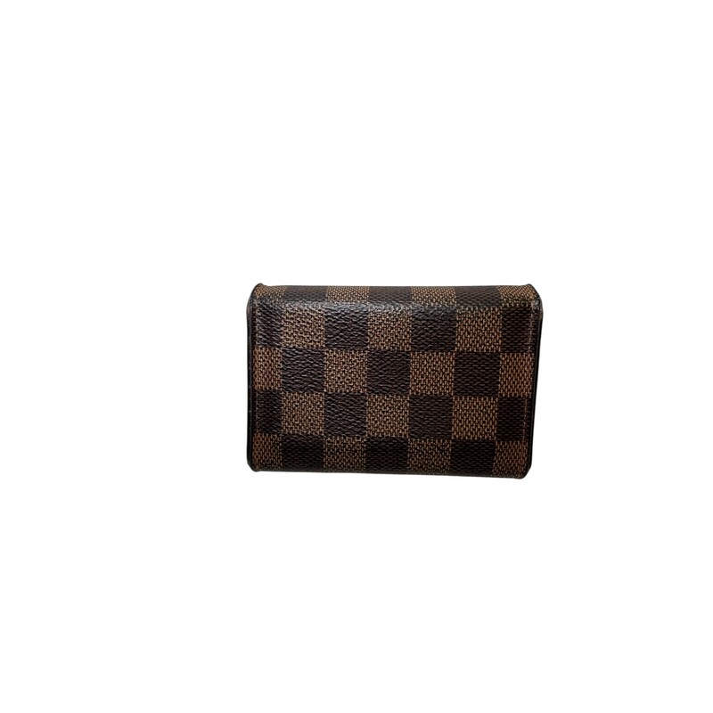 Louis Vuitton Rosa Ebene Wallet

Code: UB2109

Dimensions:
Length: 4 in
Height: 3 in
Width: 0.5 in

In fair condition. Wear to the trim, interior and exterior. Snap coloring worn as well.

Comes with the original dust bag and box.