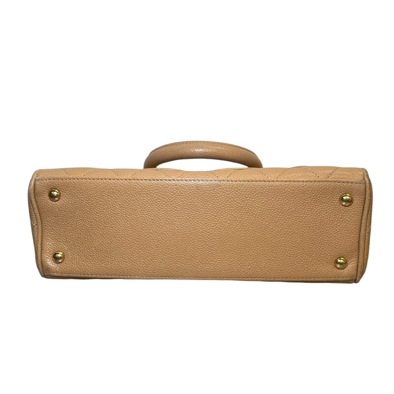 Chanel Timeless Bowler Caviar Beige Bowler<br />
<br />
Code: 9715***<br />
<br />
Dimensions:<br />
10.5W x 6H x 3.5D<br />
4 handle drop<br />
<br />
In very good condition. Wear to the corners and handles.<br />
<br />
Does not come with the original dust bag or box.
