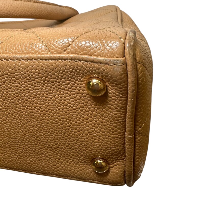 Chanel Timeless Bowler Caviar Beige Bowler<br />
<br />
Code: 9715***<br />
<br />
Dimensions:<br />
10.5W x 6H x 3.5D<br />
4 handle drop<br />
<br />
In very good condition. Wear to the corners and handles.<br />
<br />
Does not come with the original dust bag or box.