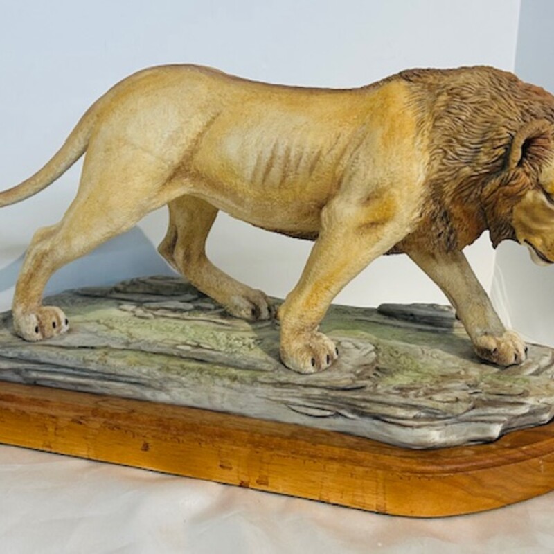 Boehm Asian Lion Figurine on Wood Stand
Tan Green Gray Brown Size: 16 x 8.5H