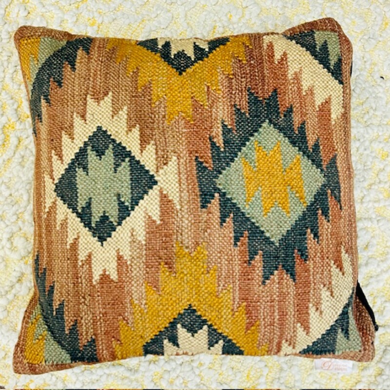 Devine Kilim Wool Pillow
EarthTones Wool and Jute with Black Velour Back
Size: 18x18
Beautifully loomed with a textural blend of wool and jute to closely mimic kilim rugs that have been treasured for centuries. Each pillow includes a polyfill insert and is sized to fill an empty spot with visual warmth.
Coordinating Pillow Sold Separately