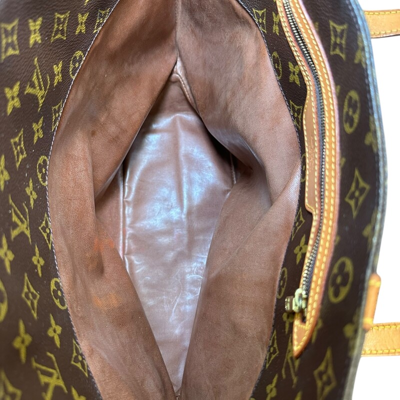 Louis Vuitton Sac Shopping Tote Monogram<br />
<br />
Dimenisons:<br />
Base length: 10 in<br />
Width: 5.5 in<br />
Height: 13 in<br />
Drop: 12.5 in<br />
Longest length : 20 in<br />
<br />
In good condition. Light vintage odor to interior. Wear to leather and interior.<br />
<br />
Does not come with the original dust bag or box.