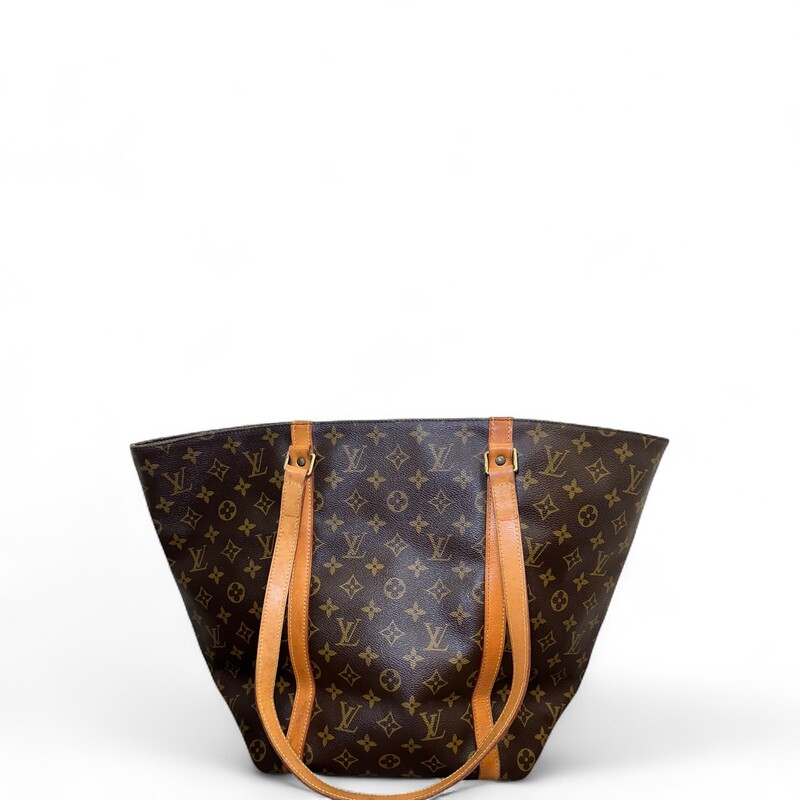 Louis Vuitton Sac Shopping Tote Monogram<br />
<br />
Dimenisons:<br />
Base length: 10 in<br />
Width: 5.5 in<br />
Height: 13 in<br />
Drop: 12.5 in<br />
Longest length : 20 in<br />
<br />
In good condition. Light vintage odor to interior. Wear to leather and interior.<br />
<br />
Does not come with the original dust bag or box.
