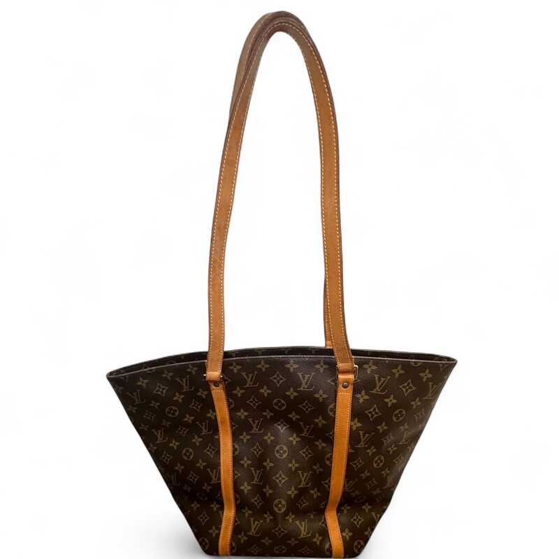 Louis Vuitton Sac Shopping Tote Monogram

Dimenisons:
Base length: 10 in
Width: 5.5 in
Height: 13 in
Drop: 12.5 in
Longest length : 20 in

In good condition. Light vintage odor to interior. Wear to leather and interior.

Does not come with the original dust bag or box.