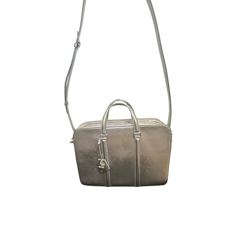 Celine Macadam Briefcase Silver<br />
<br />
Code: U-MA-0179<br />
<br />
Dimensions:<br />
13.75inL x 9.75inHx2inW<br />
<br />
In excellent condition.<br />
<br />
Comes with the original dust bag. No box.