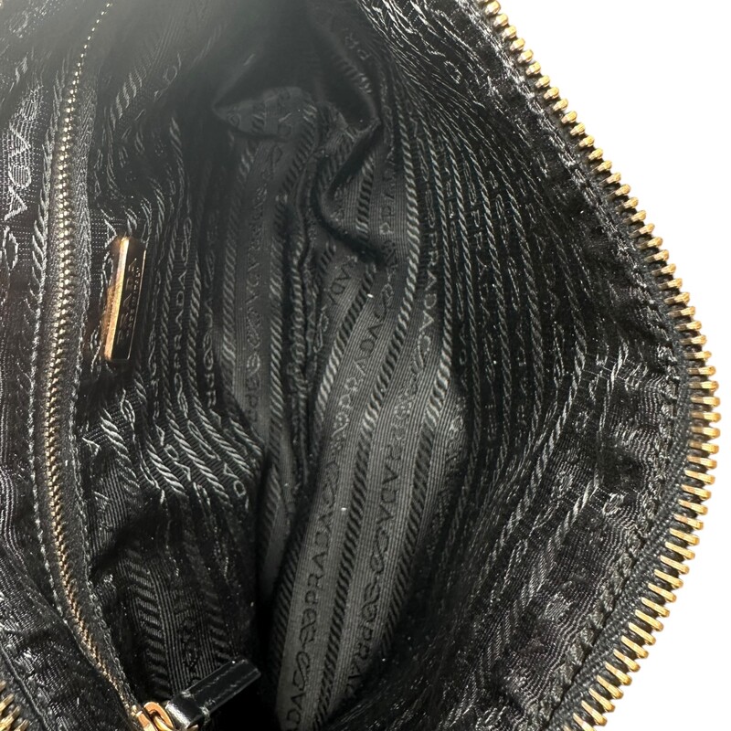 Prada Fiocco Shoulder Black Leather Bag<br />
<br />
Factory Code: 50<br />
<br />
Dimensions:<br />
12.75in x 7in<br />
<br />
In very good condition. Light scuffing to the leather.<br />
<br />
Does not come with the original dust bag or box.