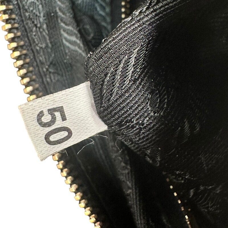 Prada Fiocco Shoulder Black Leather Bag<br />
<br />
Factory Code: 50<br />
<br />
Dimensions:<br />
12.75in x 7in<br />
<br />
In very good condition. Light scuffing to the leather.<br />
<br />
Does not come with the original dust bag or box.