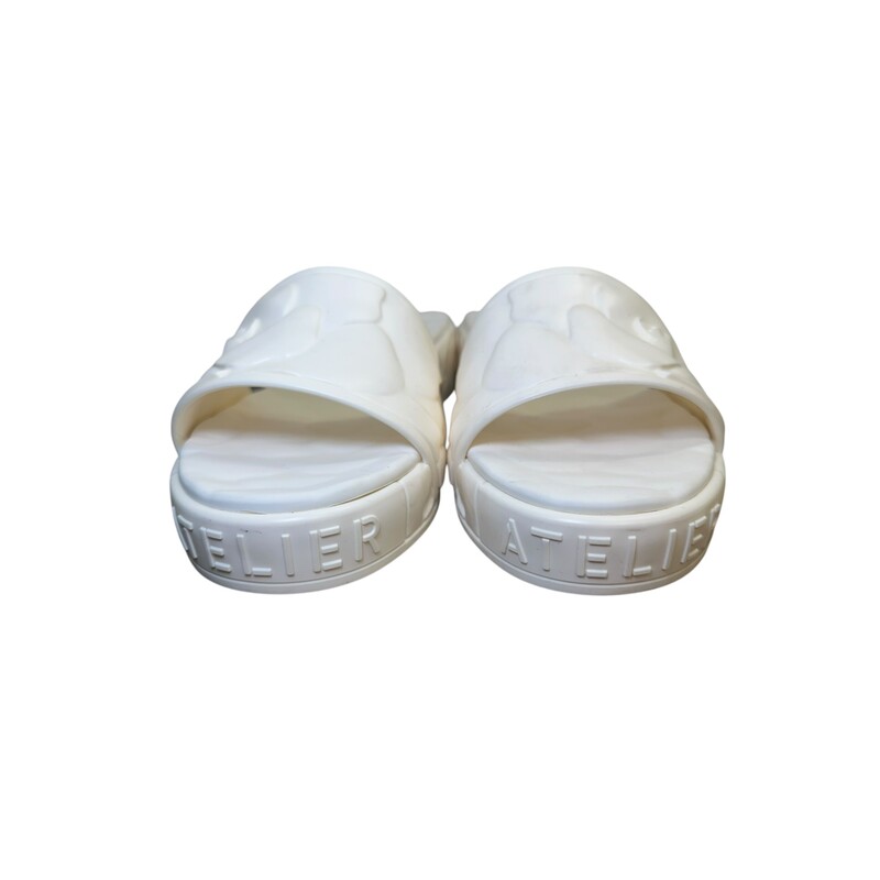 Valentino Atelier Rubber, White,<br />
<br />
Size: 41<br />
<br />
In very good condition. Light marks to the bottoms.<br />
<br />
Does not come with the original dust bag or box.