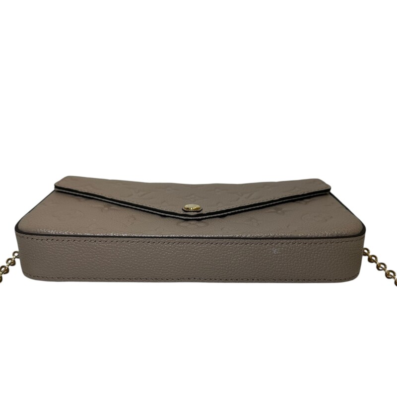 Louis Vuitton Pochette Félicie Turtledove Empriente<br />
<br />
Chipped<br />
<br />
Dimensions:<br />
8.3 x 4.7 x 1.2 inches<br />
(Length x Height x Width)<br />
<br />
In very good condition. Light scuffing to the hardware.<br />
<br />
Comes with the credit card insert not the pouch zip insert.<br />
<br />
Does not come with the original dust bag or box.