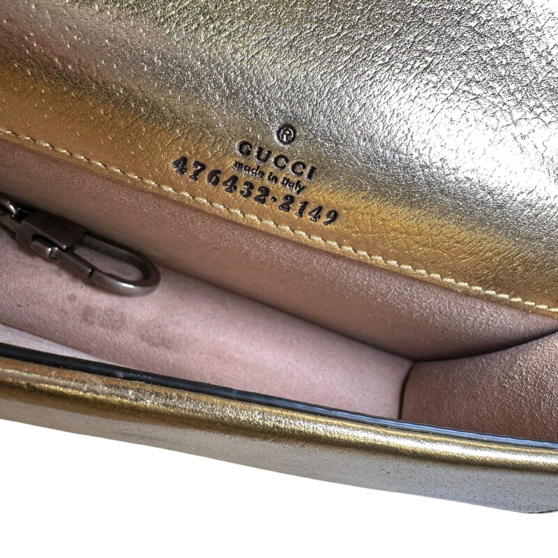 Gucci Dionysus Super Mini Gold Leather Bag<br />
<br />
Style Code:<br />
476432 2149<br />
<br />
Dimensions:<br />
6.5 Wx 3.9 H x 1.6 D<br />
<br />
In very good condition. Light marks to the interior.<br />
<br />
Comes with the original dust bag. No box.