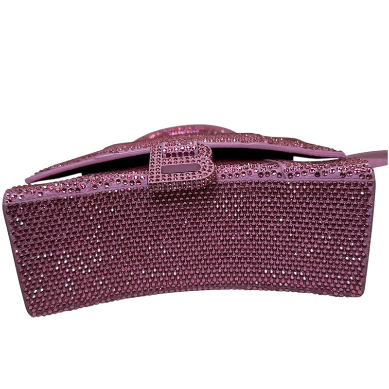 Balenciaga Hourglass XS Hangbag Pink Crystal<br />
<br />
Dimensions:<br />
5.1H 7.4W 3.1D<br />
<br />
In excellent condition.<br />
<br />
Does not come with the original dust bag or box.