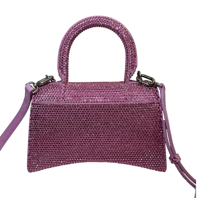 Balenciaga Hourglass XS Hangbag Pink Crystal<br />
<br />
Dimensions:<br />
5.1H 7.4W 3.1D<br />
<br />
In excellent condition.<br />
<br />
Does not come with the original dust bag or box.
