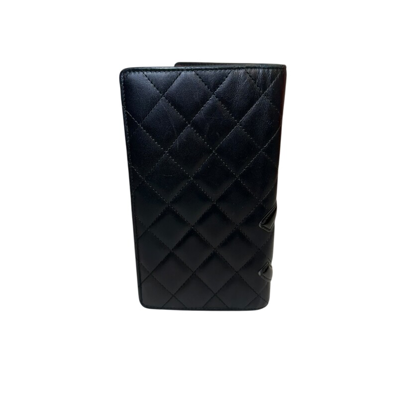 Chanel Cambon Leather Long Black Wallet<br />
<br />
Code: 1413****<br />
<br />
Dimensions:<br />
7.25 in H x 4.5 W x 1in<br />
<br />
In very good condition. Light wear to the interior and light corner wear.<br />
<br />
Does not come with the original dust bag or box.