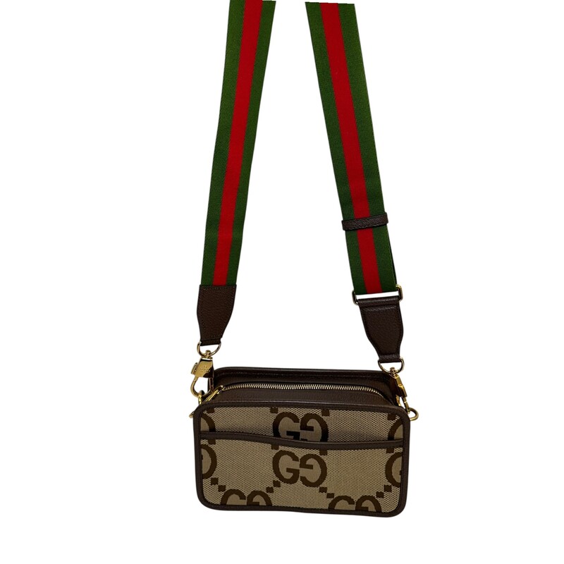 Gucci Camera Jumbo Canvas Bag<br />
<br />
Style Code:695075 2184<br />
<br />
Dimensions: 9 L x 5 H inches<br />
<br />
In very good condition. Very minor scratches on hardware.<br />
<br />
Comes with the original dust bag and box.