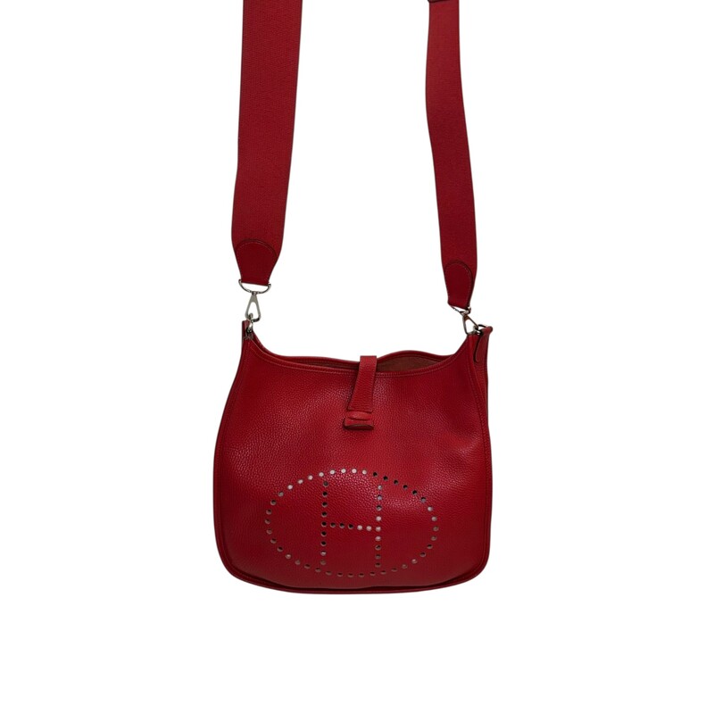 Hermes Evelyne Clemence Generation III Crossbody<br />
<br />
Date Code:T(2015)<br />
<br />
Dimensions:12.5W x 12H x 4D inches<br />
<br />
In good condition. Coner wear and some black marks on the back leather. Some warping of leather buckle.<br />
<br />
Comes with the original dust bag and box.