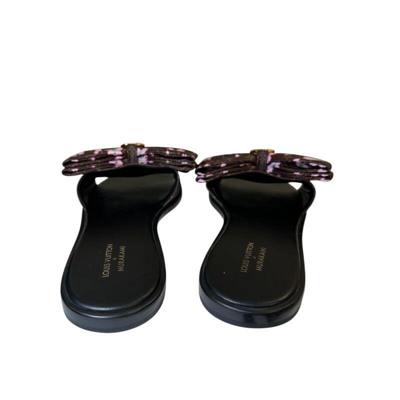 Louis Vuitton X TM Lily Sandals Brown,

Size: 37.5

Code: GG 1224

In very good condition. Light wear to the bottom soles. Tear on bow shown in photos.

Comes with the original dust bag and box.