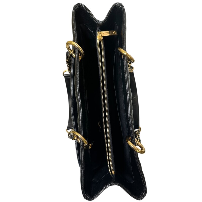 Chanel Grand Shopper Black Caviar Tote<br />
<br />
Serial Code: 1986****<br />
<br />
Dimnensions:<br />
Length: 13.25 in<br />
Height: 9.75 in<br />
Width: 5.25 in<br />
Drop: 9.75 in<br />
<br />
In excellent condition. Very faint scratching on the hardware.<br />
<br />
Does not come with the original dust bag or box.