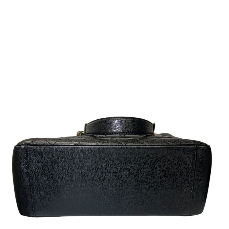 Chanel Grand Shopper Black Caviar Tote<br />
<br />
Serial Code: 1986****<br />
<br />
Dimnensions:<br />
Length: 13.25 in<br />
Height: 9.75 in<br />
Width: 5.25 in<br />
Drop: 9.75 in<br />
<br />
In excellent condition. Very faint scratching on the hardware.<br />
<br />
Does not come with the original dust bag or box.