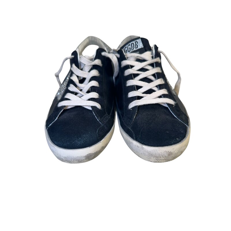 Golden Goose Super Star Black & Silver Sneakers<br />
<br />
Size: 39<br />
<br />
In very good condition.<br />
<br />
Does not come with the original dust bag or box.