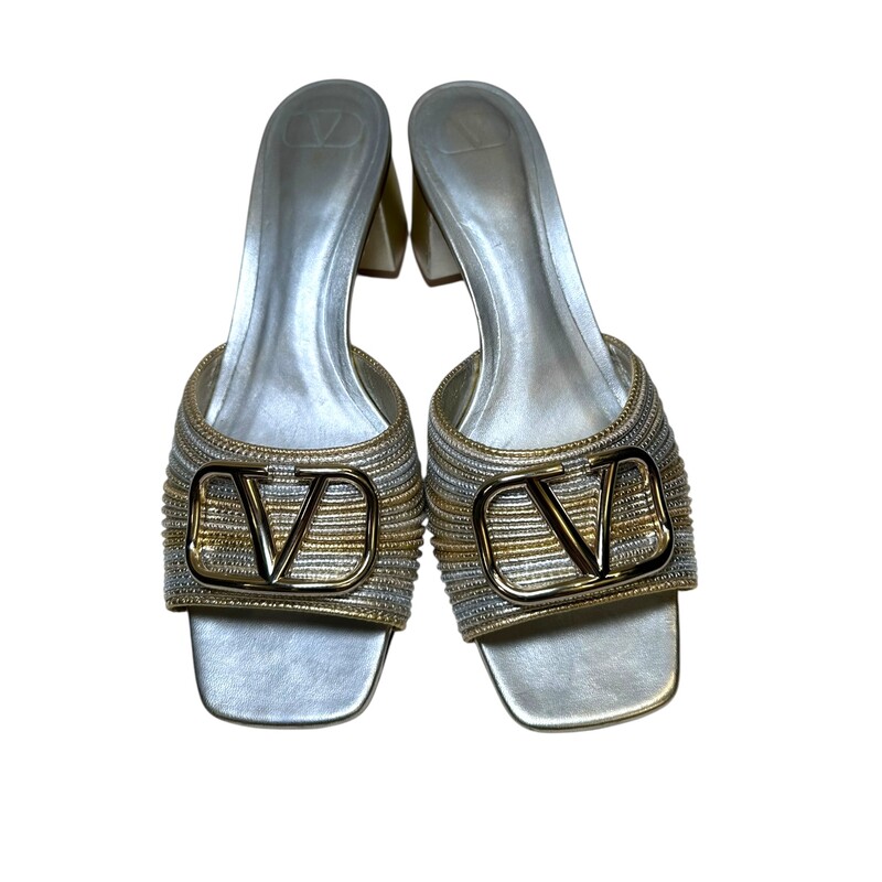 Valentino Medallion Slide Metallic Heels<br />
<br />
Size: 40<br />
<br />
Codes: EX 6 HA6<br />
<br />
In very good condition. Light scuffs to the heels. And wear to the bottom of the shoes.<br />
<br />
Does not come with the original dust bag or box.