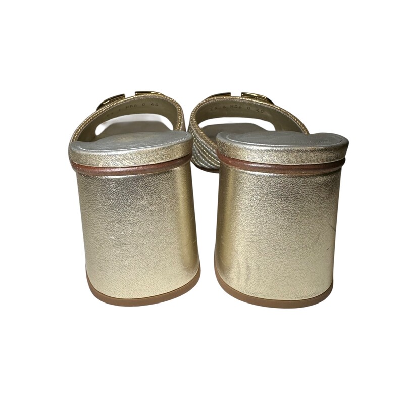 Valentino Medallion Slide Metallic Heels<br />
<br />
Size: 40<br />
<br />
Codes: EX 6 HA6<br />
<br />
In very good condition. Light scuffs to the heels. And wear to the bottom of the shoes.<br />
<br />
Does not come with the original dust bag or box.