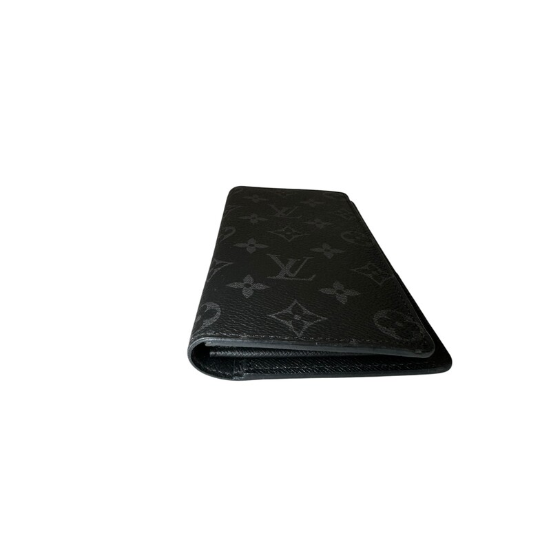 Louis Vuitton Brazza Monogram Eclipse<br />
<br />
Code:<br />
<br />
Dimensions:<br />
3.9 x 7.5 x 0.8 inches<br />
(Length x Height x Width)<br />
<br />
In very good condition. Light wear to the interior.<br />
<br />
Comes with the original dust bag. No box.