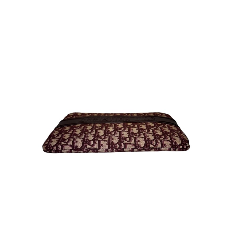 Christian Dior Clutch Monogram Clutch<br />
<br />
Date Code:26-MA-1108<br />
<br />
Dimensions: 10 L x 8 H inches<br />
<br />
In very good condition. Some minor marks inside the interior.<br />
<br />
Does not come with the original dust bag or box.