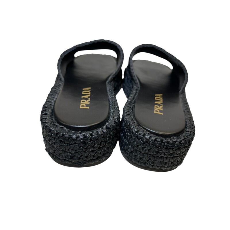 Prada Woven Flatform  Raffia Slides<br />
<br />
Style Code:761<br />
<br />
Size 41<br />
<br />
In very good condition. Light wear on bottoms.<br />
<br />
Does not come with the original dust bag or box.