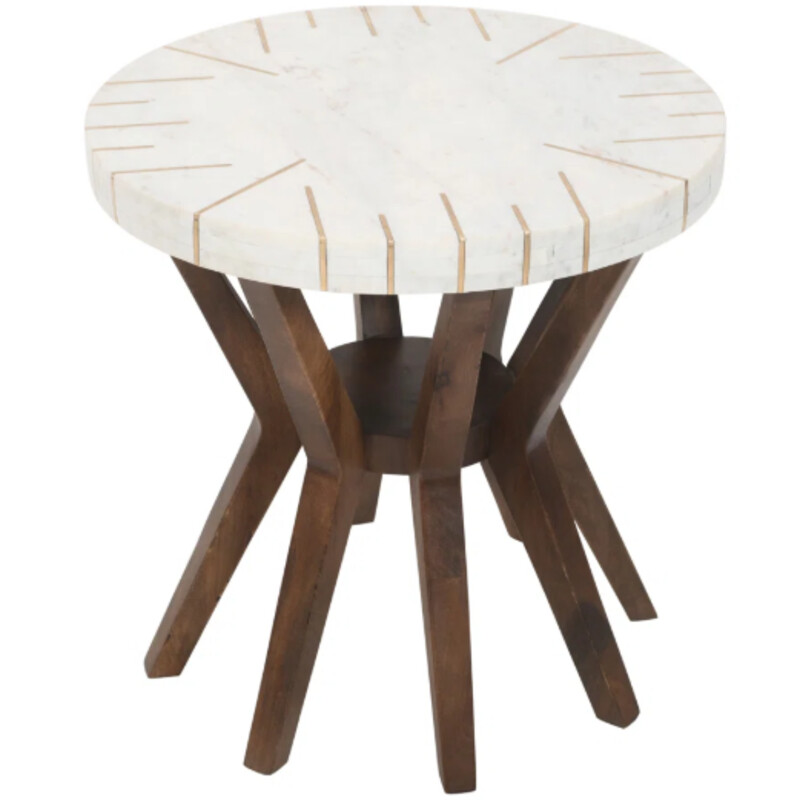 Mayfield Marble End Table
White Marble with Gold Accents on Brown Wood
Size: 22x22H
Elevate your living space with a modern touch of sophistication by incorporating this round end table. Featuring a genuine marble top with natural stone patterns and a gold-finished metal inlay, this table stands out. The base, designed with angled spider legs, is crafted from solid mango wood in a luxurious brown hue.
NEW Retail $425
Matching End Table & Cocktail Table Sold Separately