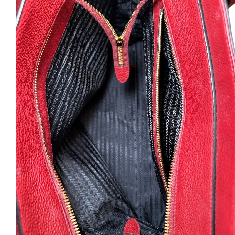 Prada Diano Leather Tote With Long Strap<br />
<br />
Factory Code:158<br />
<br />
Dimensions: 14 L X 13 H inches<br />
<br />
In excellent condition. Very faint scratching on hardware.<br />
<br />
Comes with the original dust bag. No box.
